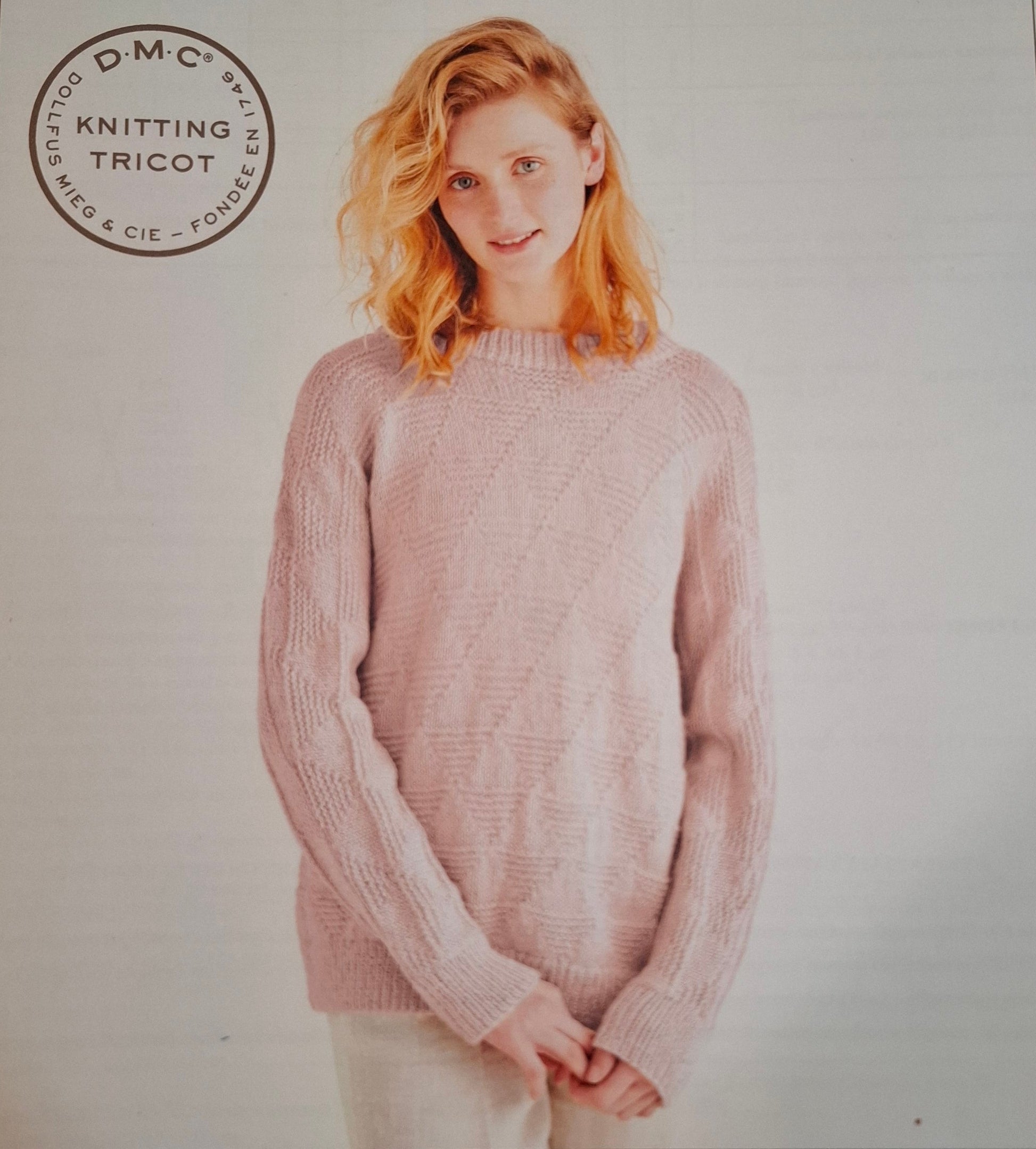 Maglione rosa ai ferri donna