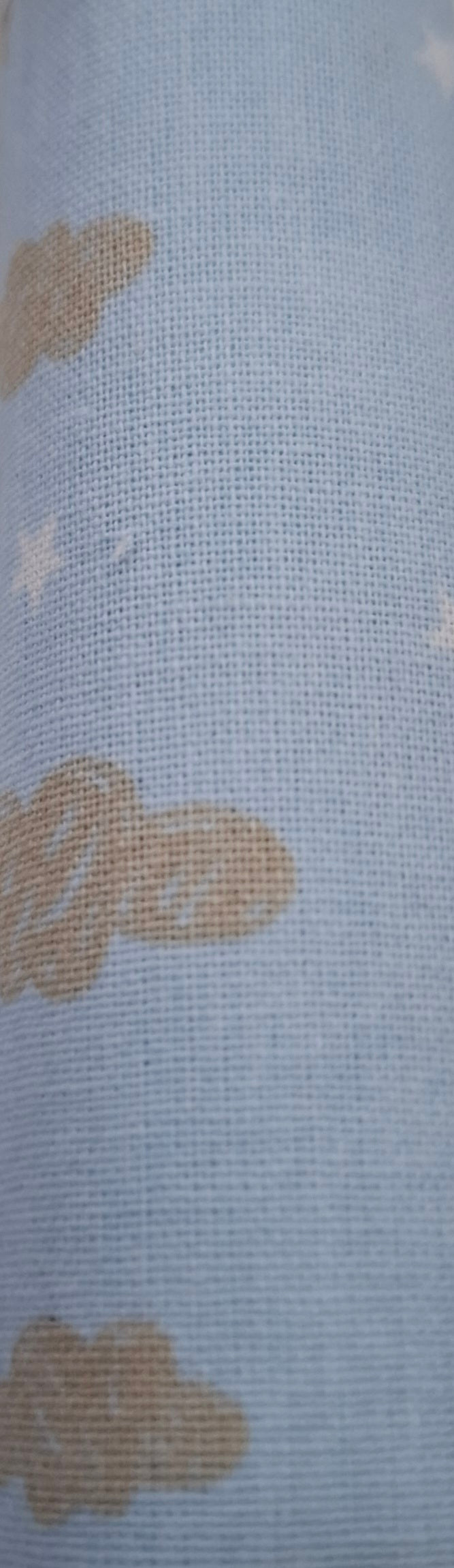 Tessuto azzurro nuvole beige 