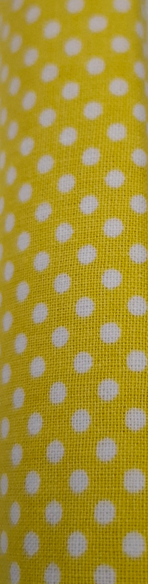 Tessuto giallo pois bianchi 