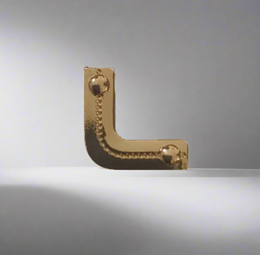 Angolare per borsa oro