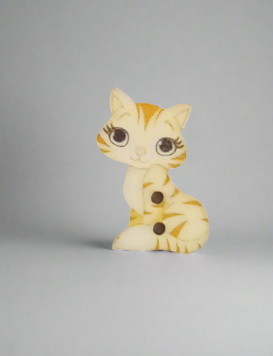 Bottone gatto seduto giallo