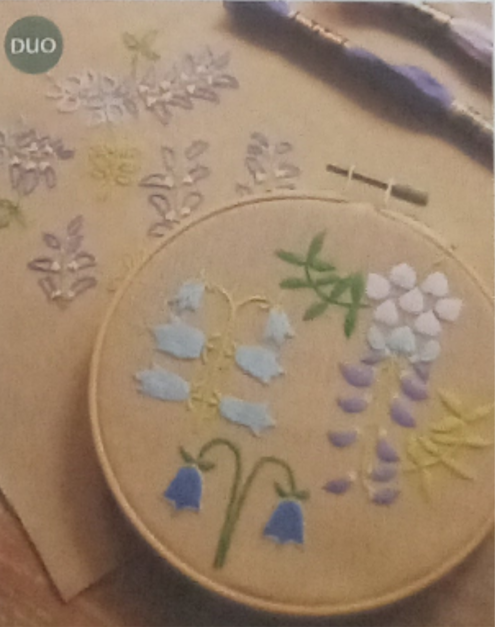 Ricamo fiori viola
