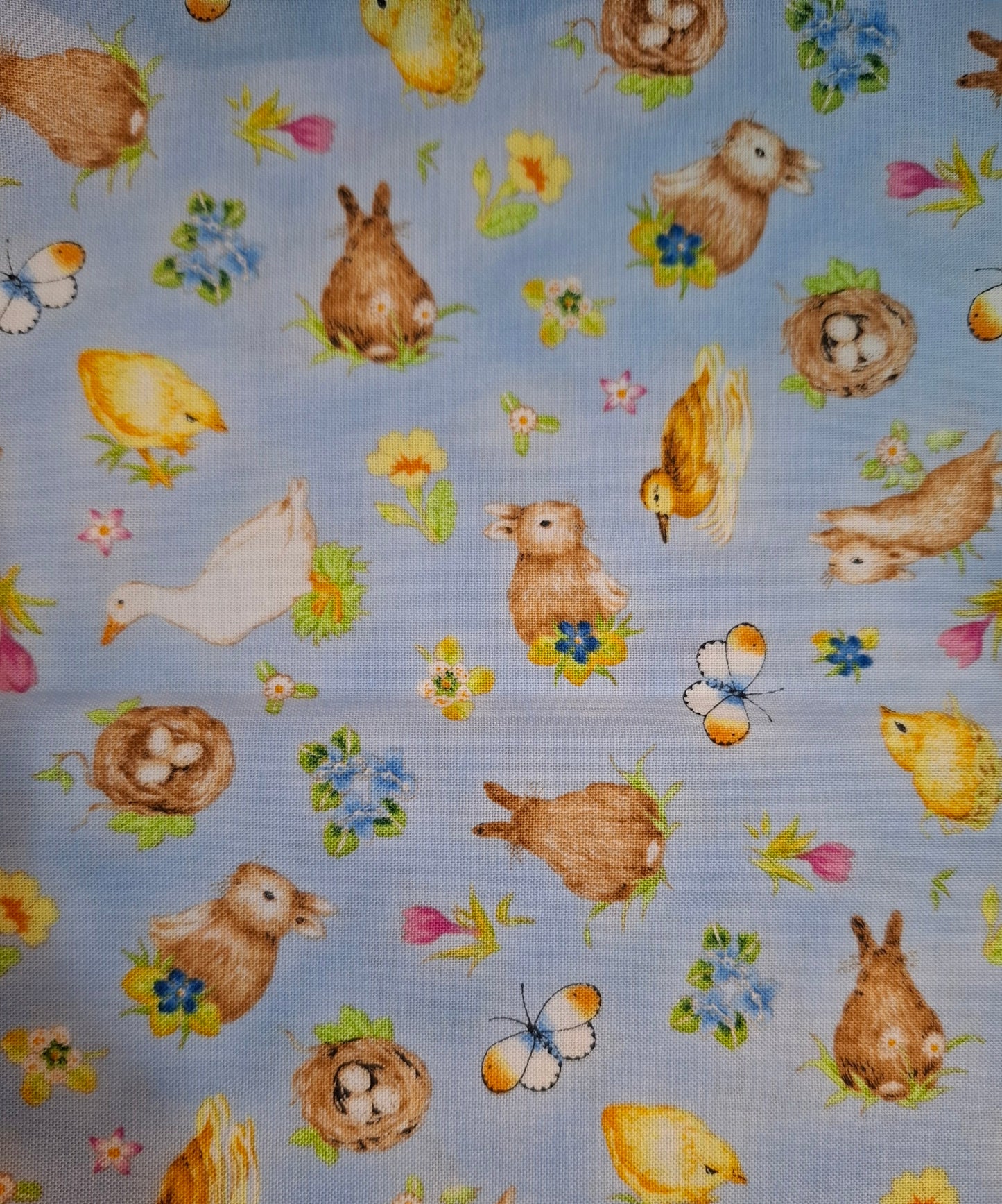 Tessuto azzurro conigli