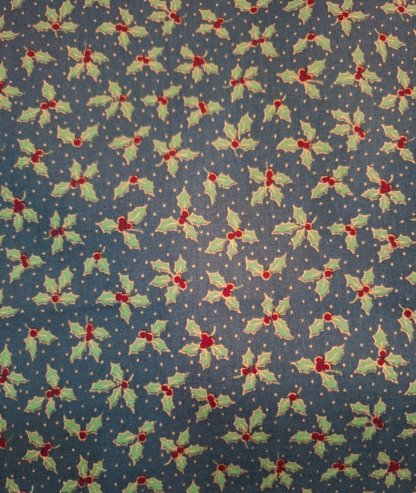 Tessuto natalizio vischio rosso e verde