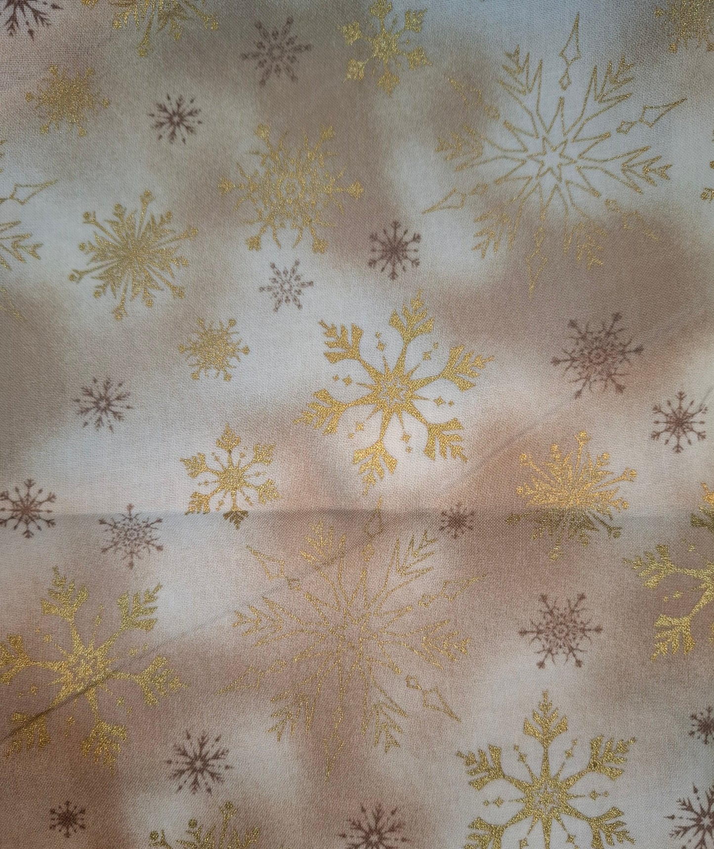Tessuto panna oro fiocchi di neve oro
