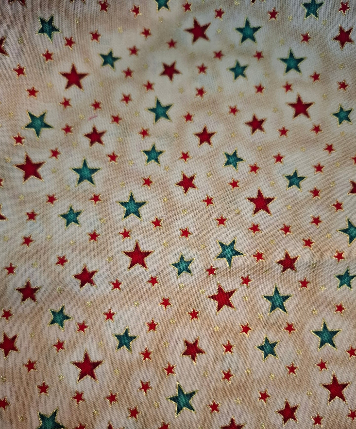 Tessuto panna stelle rosse e verdi