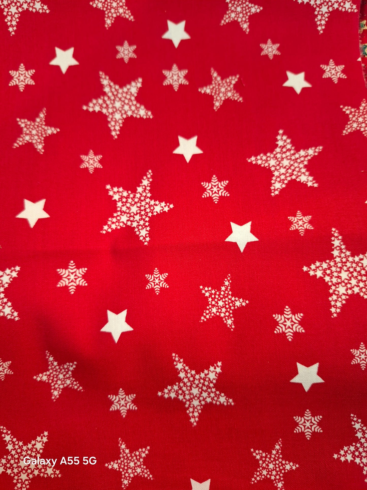 Tessuto rosso stelle bianche