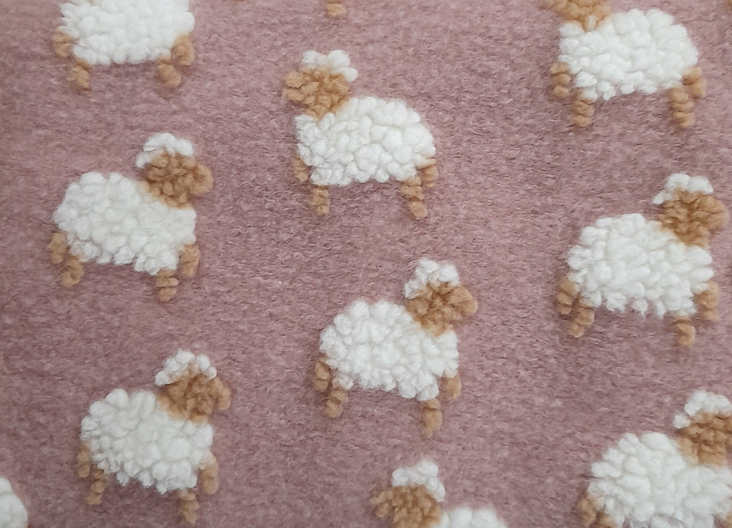 Tessuto al metro lana pecorelle rosa