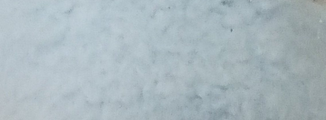 Tessuto peloso riccio azzurro 