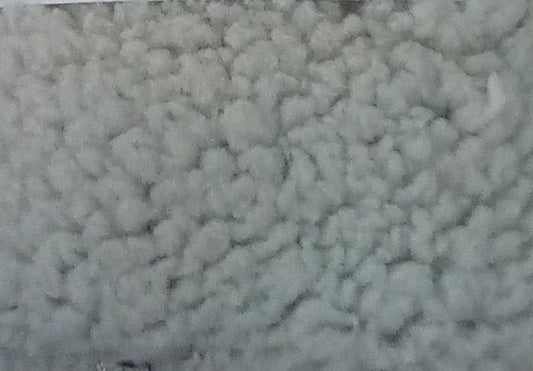 Tessuto peloso riccio grigio