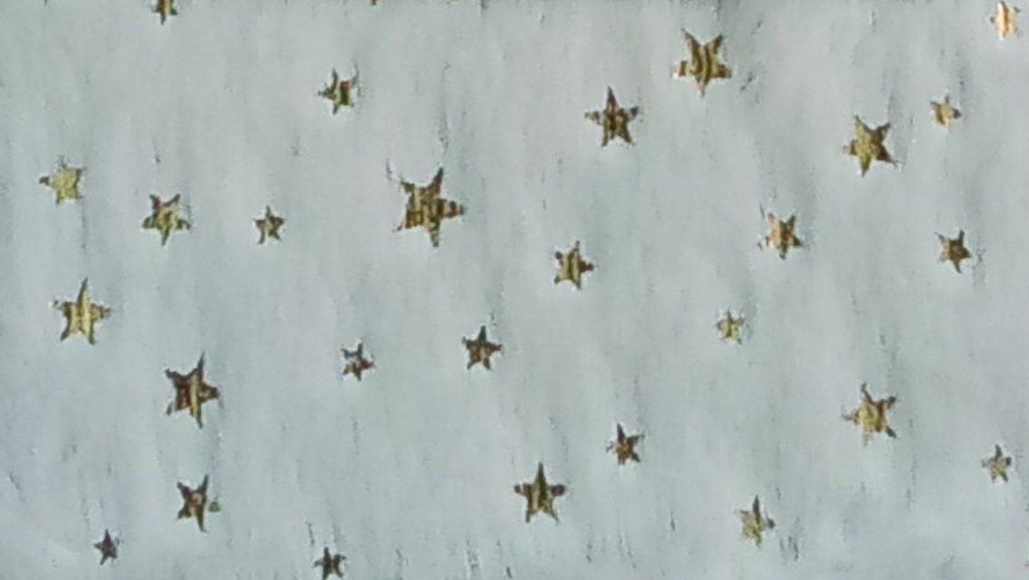 Tessuto peluche bianco stelline dorate